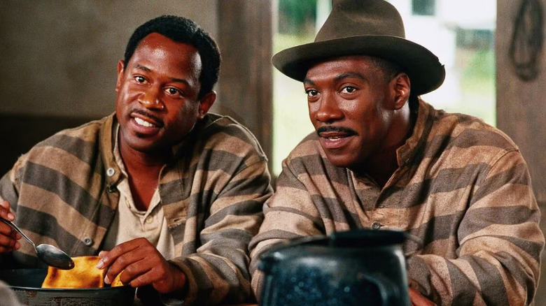 Martin Lawrence as Claude and Eddie Murphy as Ray, in a rare moment of happiness in Life