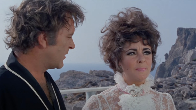Taylor talking to Richard Burton