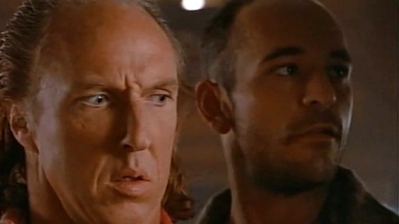 Steve has a knife held to his throat in Tales from the Crypt