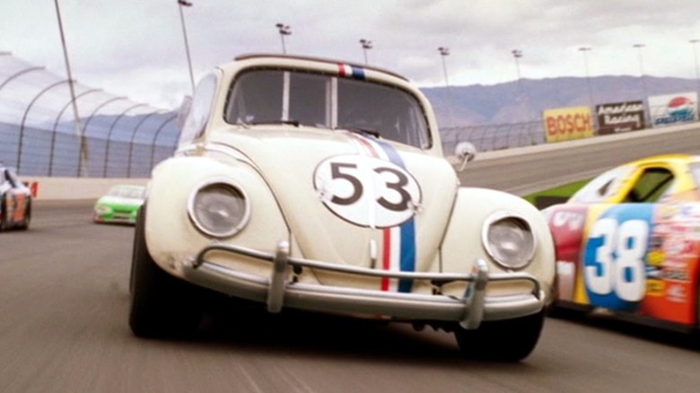 Herbie rounds a corner in a race in Herbie: Fully Loaded