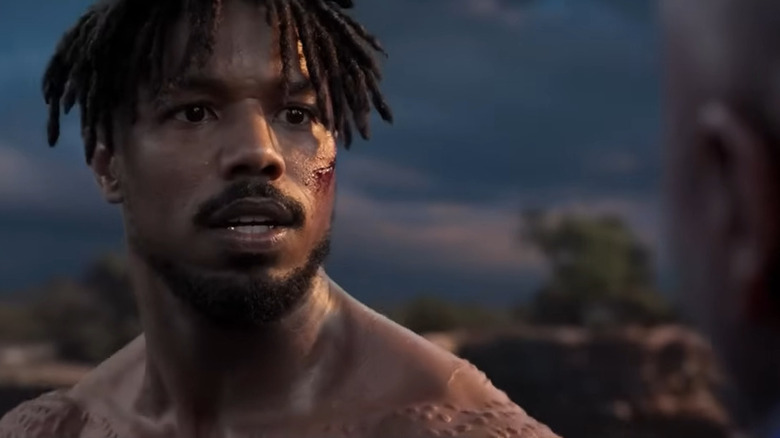 Killmonger (Michael B. Jordan) sizing up his opponent in Black Panther
