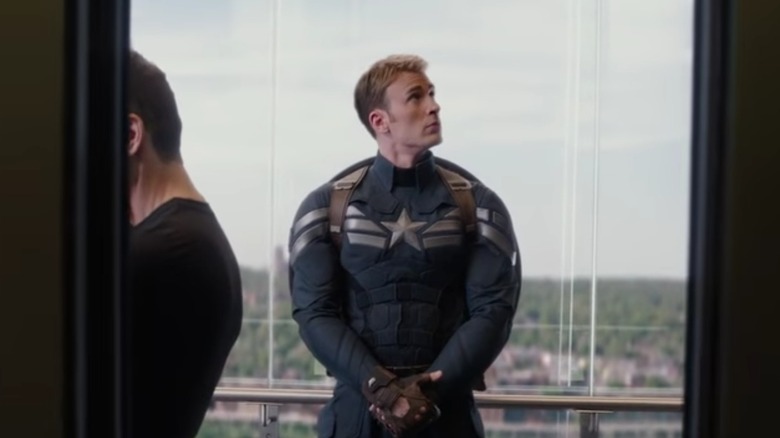 Steve Rogers (Chris Evans) waiting in an elevator in Captain America: The Winter Soldier