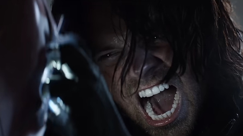 Bucky (Sebastian Stan) tearing into Iron Man's (Robert Downey Jr.) armor in Captain America: Civil War