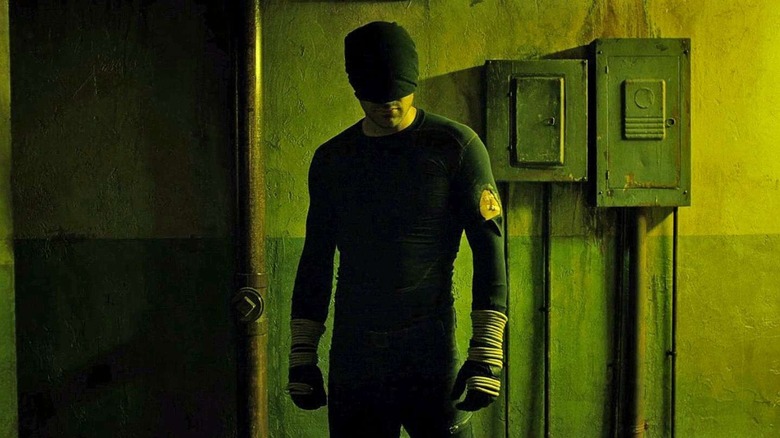 Daredevil (Charlie Cox) basked in yellow light on Daredevil Season 1