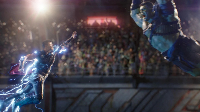 Thor (Chris Hemsworth) and Hulk (Mark Ruffalo) leaping toward one another in Thor: Ragnarok