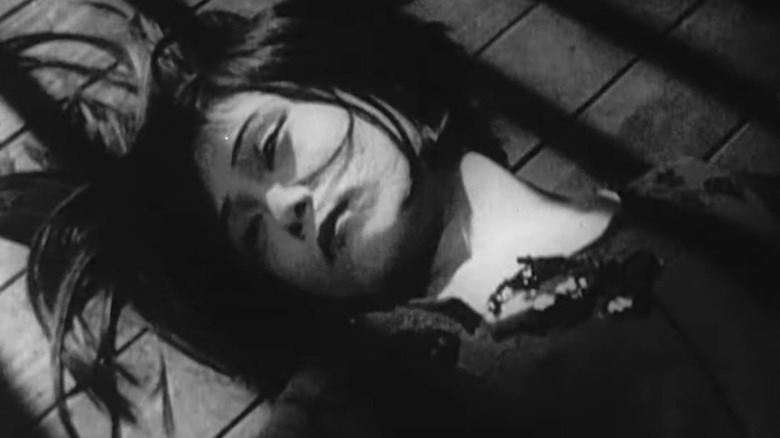 Woman lying on floor
