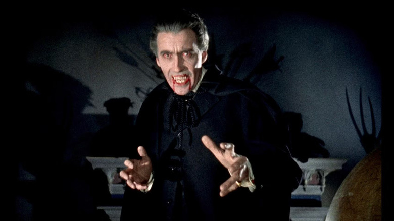 Christopher Lee as Dracula looking ready for a fight in Horror of Dracula