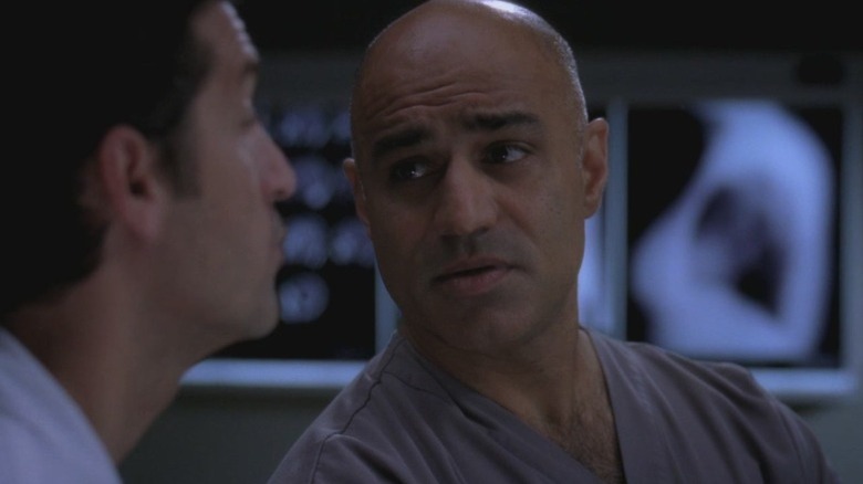 Faran Tahir as Isaac talking to Patrick Dempsey as Dr. Derek Shepherd on Grey's Anatomy