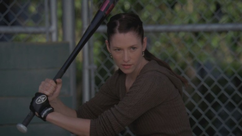 Chyler Leigh as Dr. Lexie Grey wielding a baseball bat on Grey's Anatomy