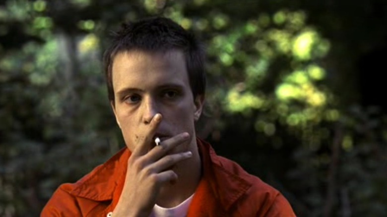23 Karl Koch smokes a cigarette