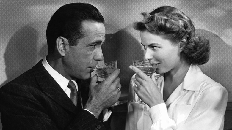 Rick and Ilsa drinking