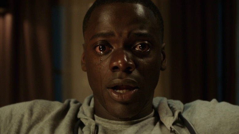 Chris Washington (Daniel Kaluuya) crying in Get Out