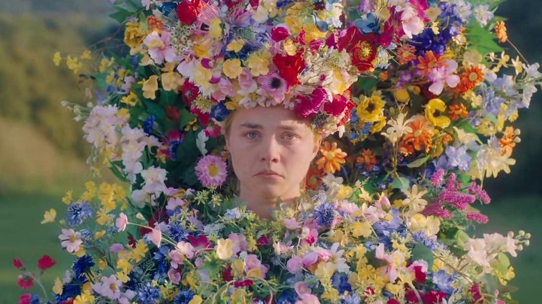 Dani (Florence Pugh) crying in a flower dress in Midsommar