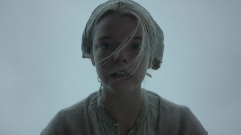 Thomasin (Anya Taylor-Joy) looking down in The Witch