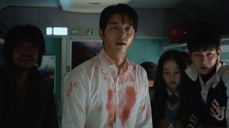 Seok-woo (Gong Yoo) soaked in blood in Train to Busan