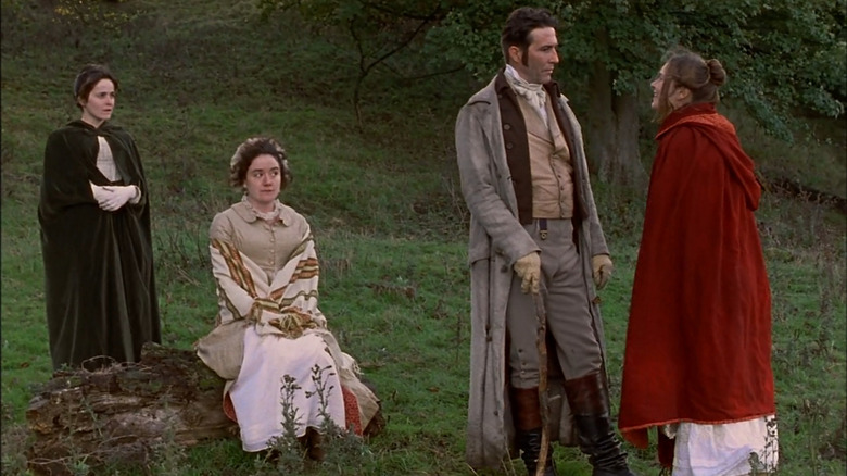 Anne (Amanda Root) and Mary (Sophie Thompson) looking at Captain Wentworth (Ciaran Hinds) and Louisa (Emma Roberts) in Persuasion