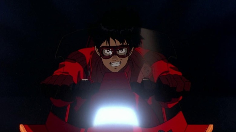 Mitsuo Iwata riding motorcycle 