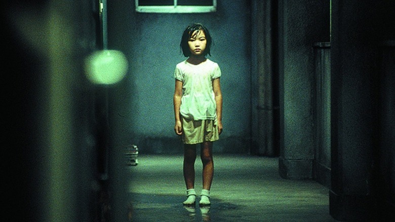 dark water girl in hallway