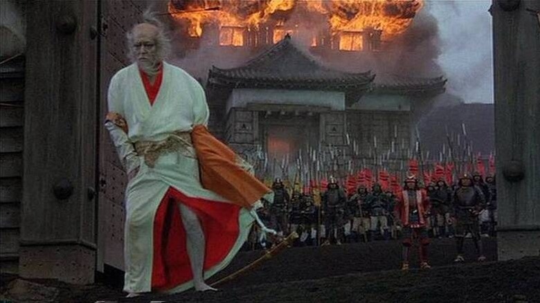 Hidetora Ichimonji (Tatsuya Nakadai) turns away from an army building a castle in Ran