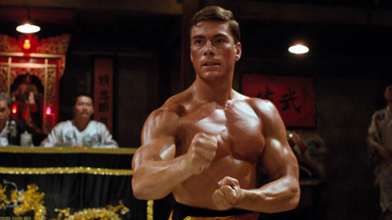 Jean-Claude Van Damme's Frank Dux posing and snarling in Bloodsport