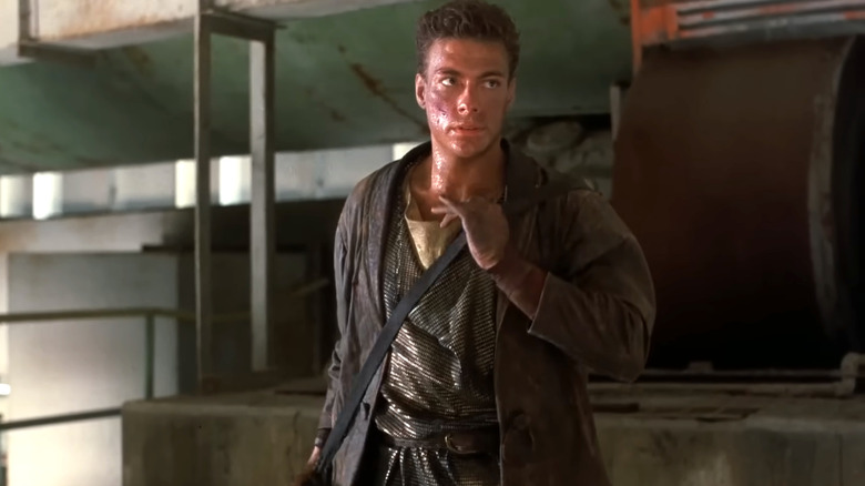 Jean-Claude Van Damme's Gibson Rickenbacker looking to the side in Cyborg