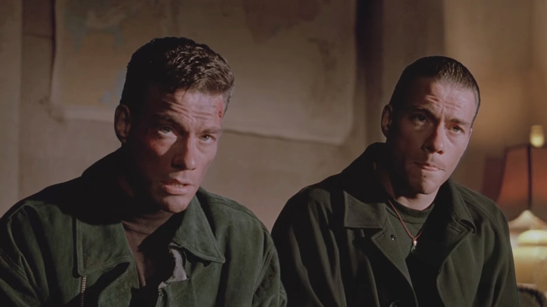 Jean-Claude Van Damme as Chad and Alex Wagner sitting down in Double Impact