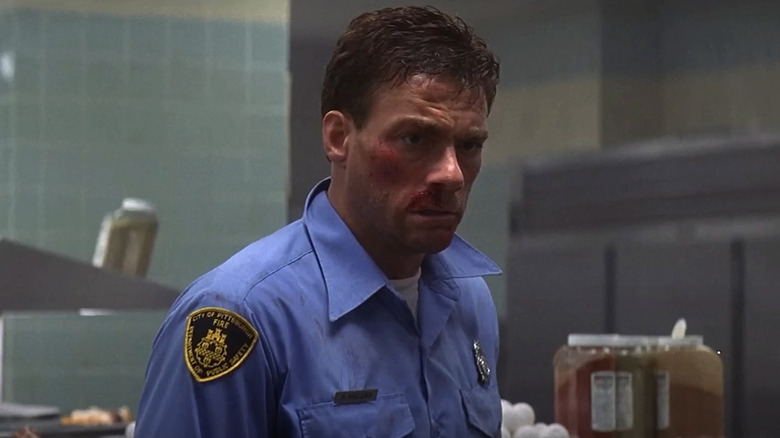 Jean-Claude Van Damme's Darren McCord staring in Sudden Death