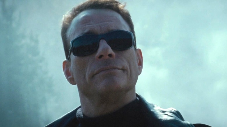 Jean-Claude Van Damme's Vilain wearing sunglasses in The Expendables 2