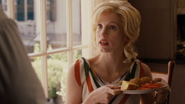 chastain holding food surprised
