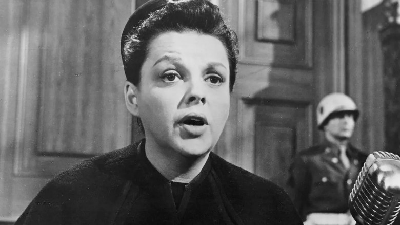 garland looking worried on trial