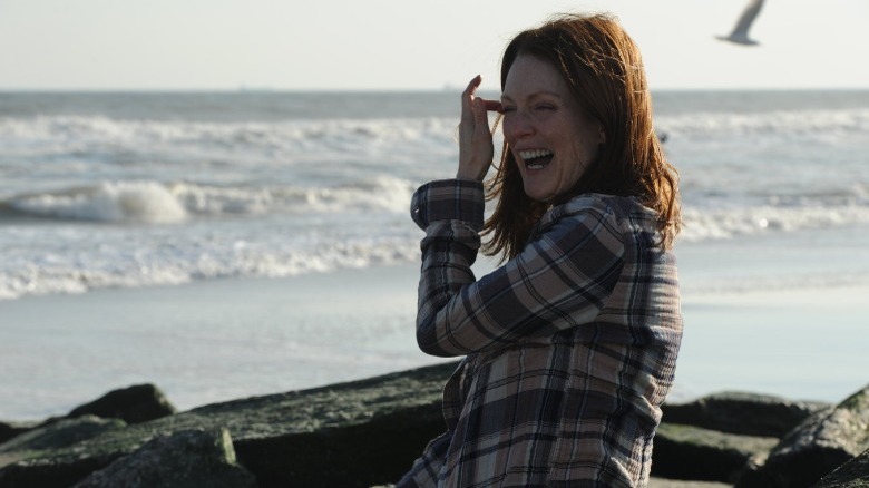Julianne Moore laughing on beach