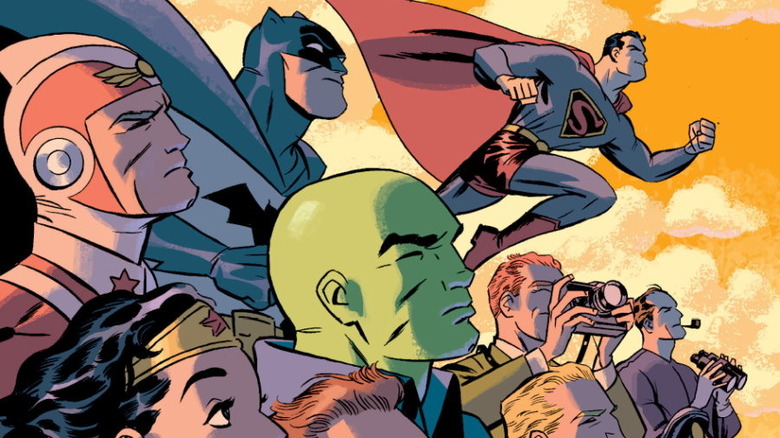 The DC heroes line up and look to the skies on the cover of DC: The New Frontier Compact Edition