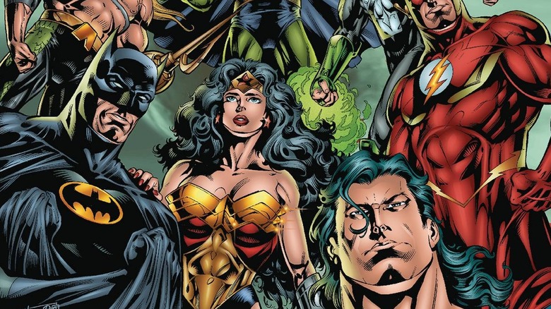 The Justice League stands together on the cover of JLA #1