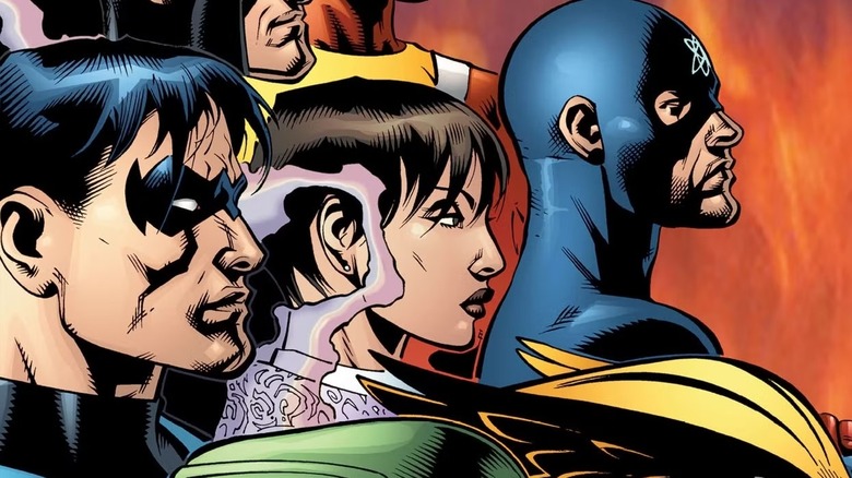 Nightwing, Zatanna, and the Atom stand looking to the right of JLA #69