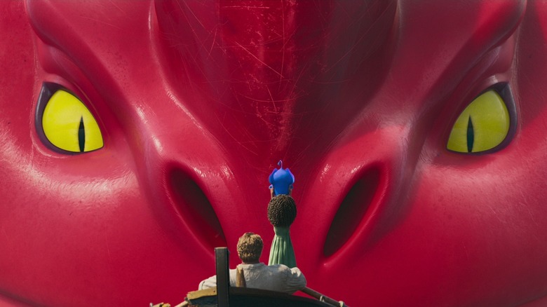 Jacob Holland and Maisie Brumble looking at Red in The Sea Beast