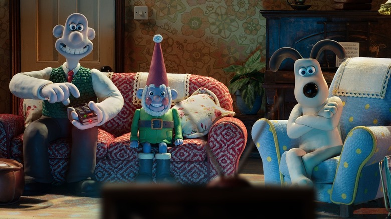 Wallace, Norbot, and Gromit watching TV in Wallace & Gromit: Vengeance Most Fowl