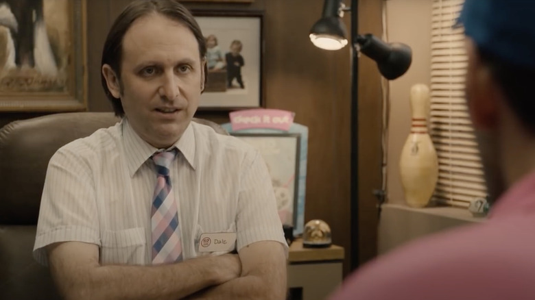 Gregg Turkington as Dale sitting across from Paul Rudd in Ant Man
