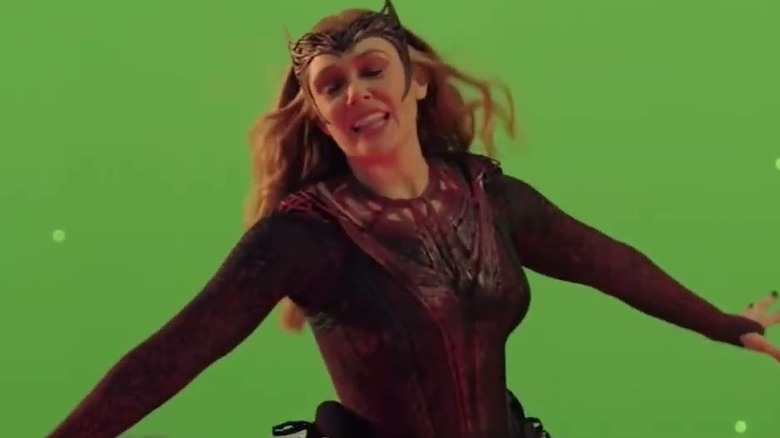 Elizabeth Olsen as Scarlet Witch flying on a green screen for Multiverse of Madness