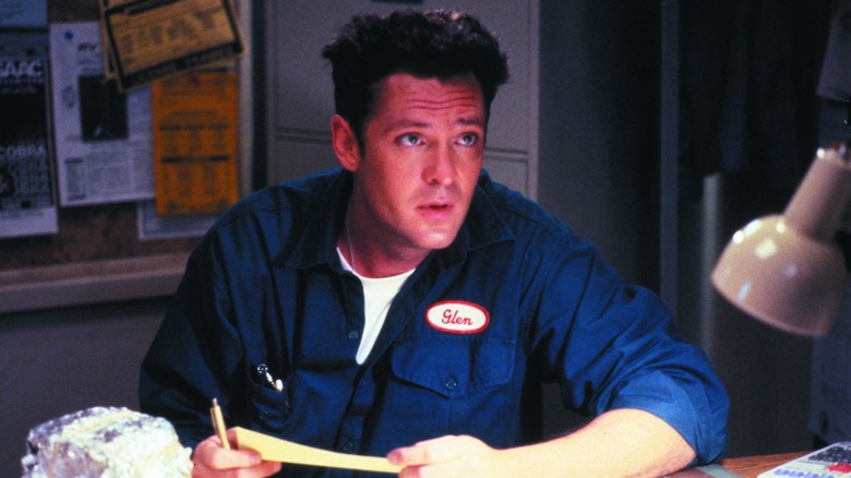 Free Willy Glen at his desk