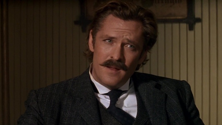 Wyatt Earp Virgil sits down