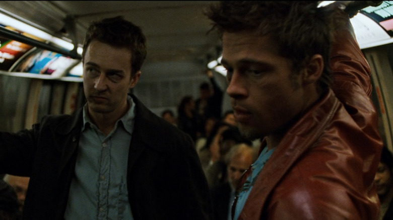 Narrator (Edward Norton) and Tyler (Brad Pitt) on subway in Fight Club