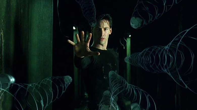 Neo (Keanu Reeves) slowing down bullets in The Matrix