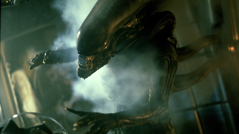 The xenomorph comes out of the shadows in Alien
