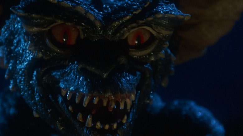 A gremlin prepares for mischief, or worse, in Gremlins
