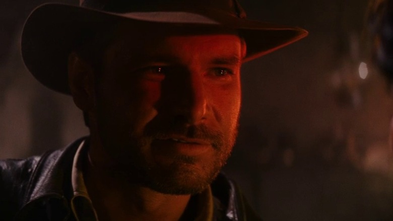 Harrison Ford lit red as Indiana Jones in Raiders of the Lost Ark