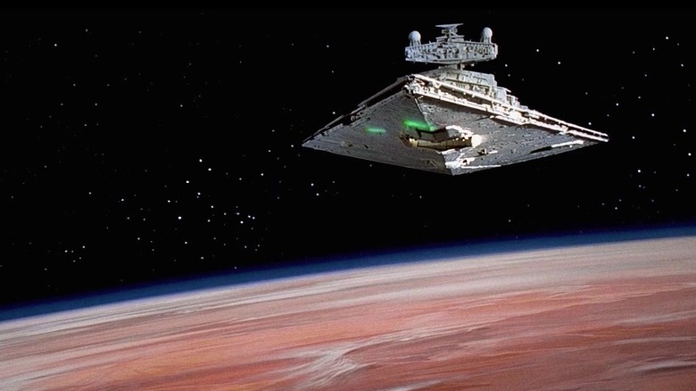 The Star Destroyer fires on a Blockade Runner, to kick off the Star Wars saga