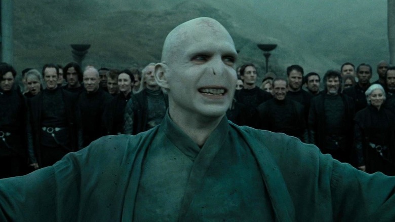Ralph Fiennes as Lord Voldemort smiling in Harry Potter and the Deathly Hallows - Part 2