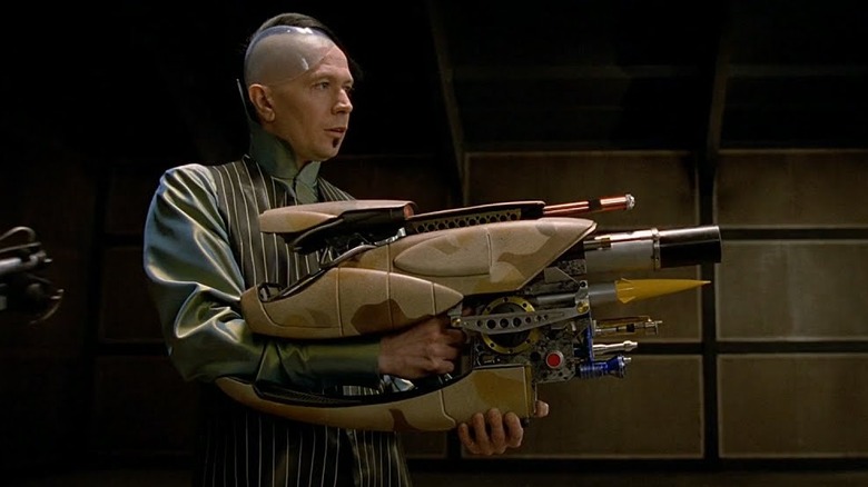 Gary Oldman as Jean Baptiste Zorg holding the Zorg ZF-1 Pod Weapon in The Fifth Elemen