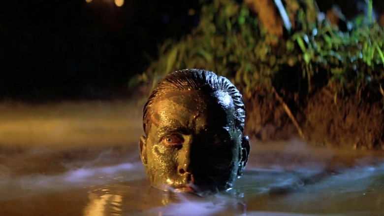 Martin Sheen rising out of water in Apocalypse Now
