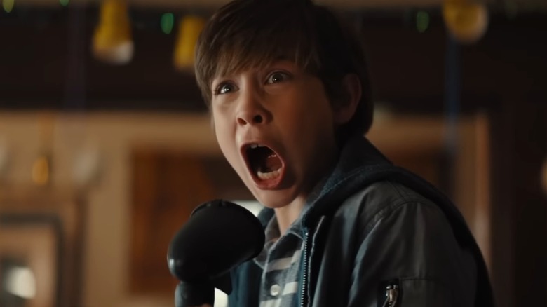 Jacob Tremblay as Max, screaming and holding a paintball gun, in Good Boys